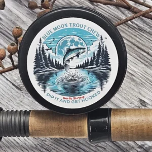 Fly fishing reel with a scenic trout club logo.